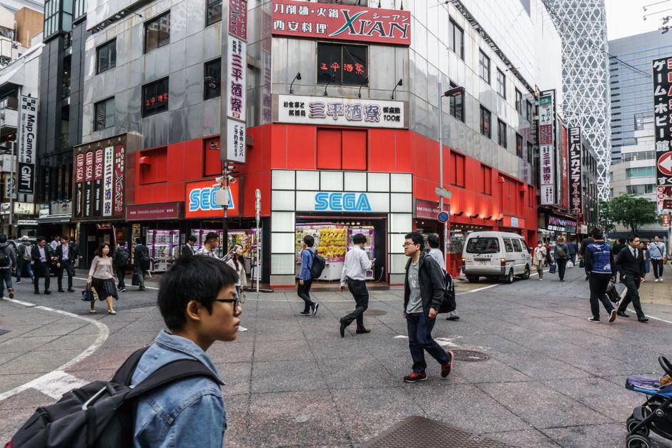 People on Street in City in Asia