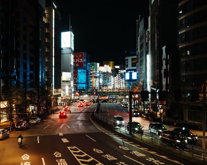 Vibrant Night Scene of Tokyo S Neon Lit Streets